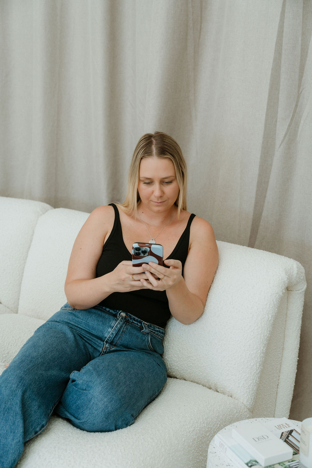 Tiarna following up outstanding invoices from her phone